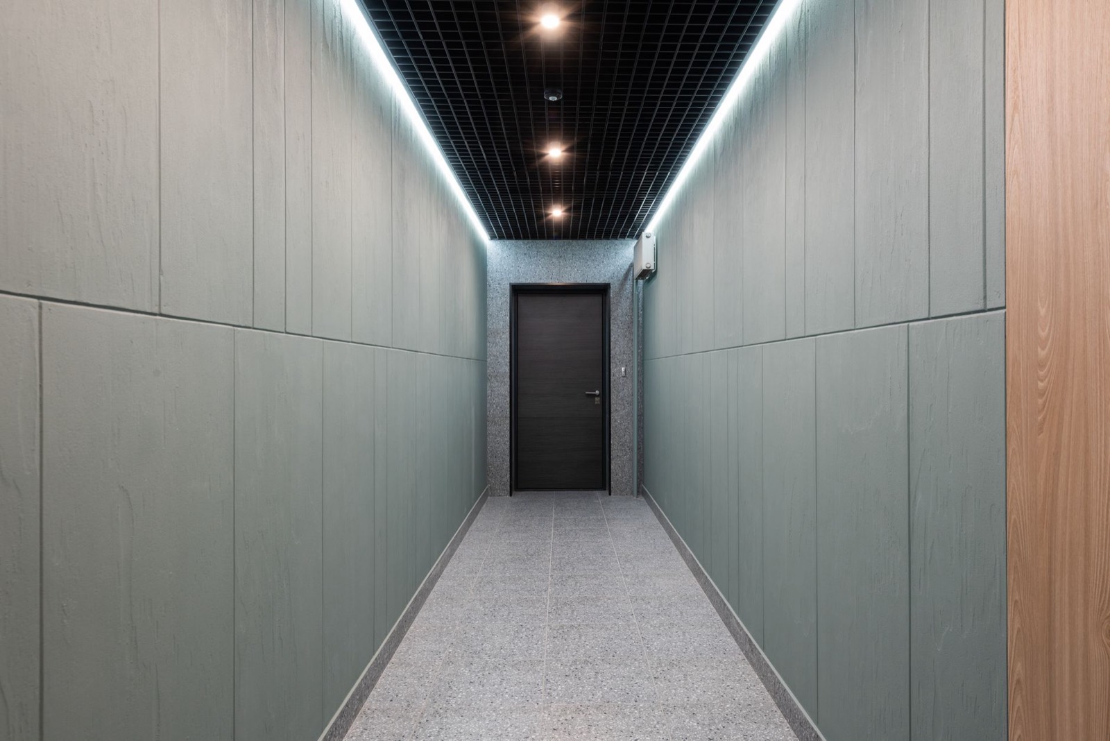 Narrow hallway where accent cabinet depth determines whether the walking route stays clear