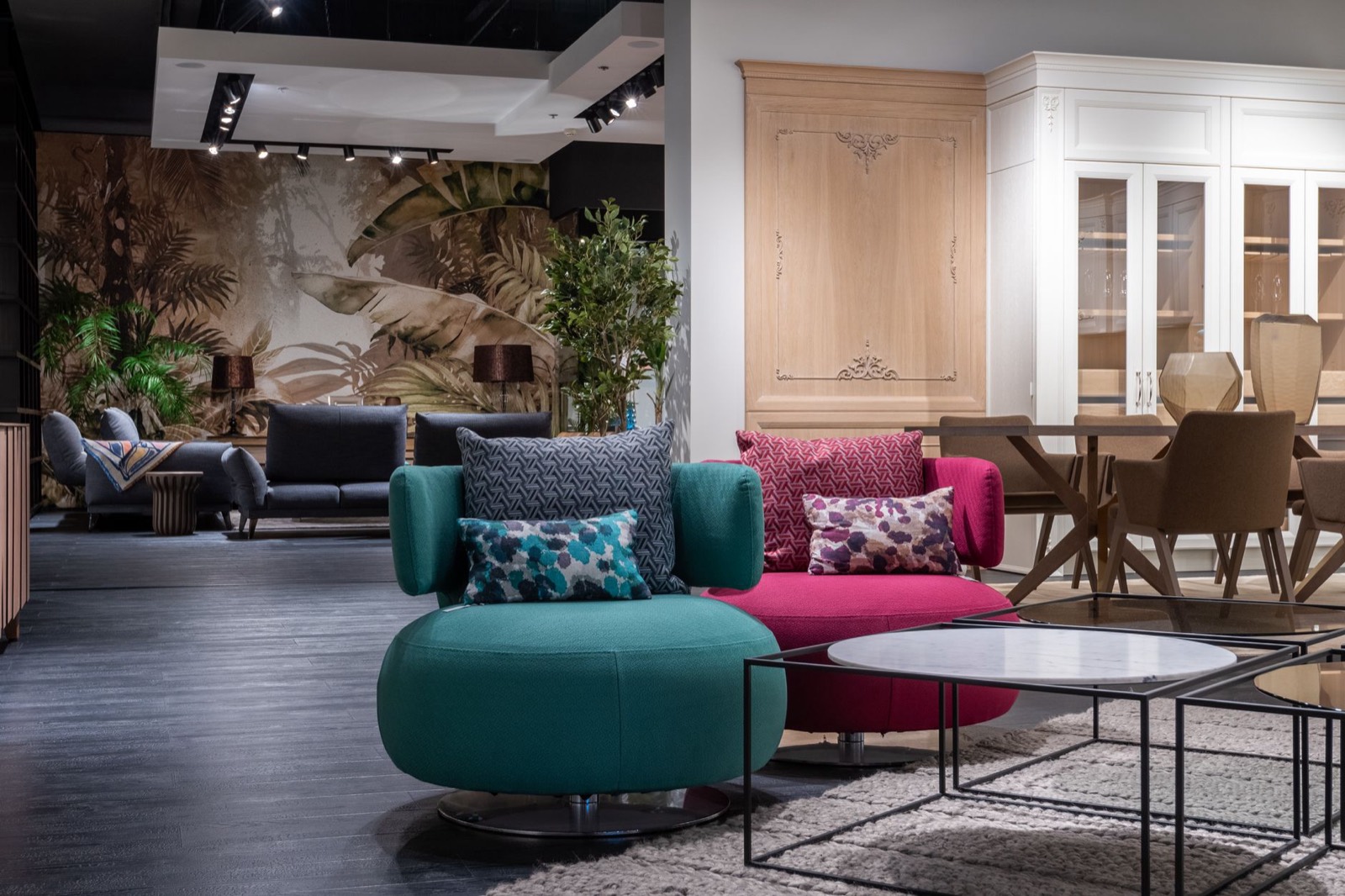 Accent chairs displayed in a showroom where seat height can be compared against sofas