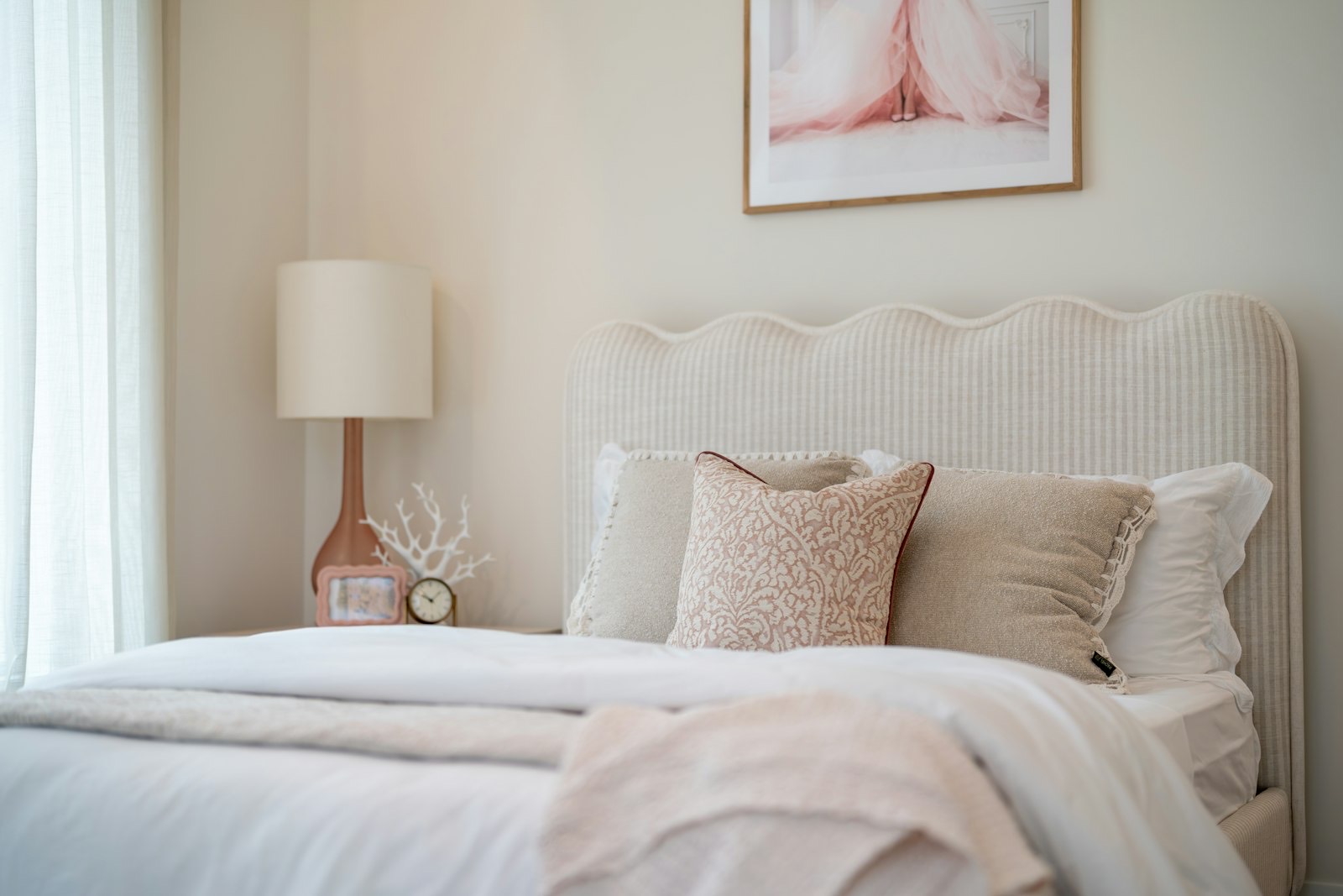 Bed with raised pillows in a modern bedroom, the setup an adjustable base replaces