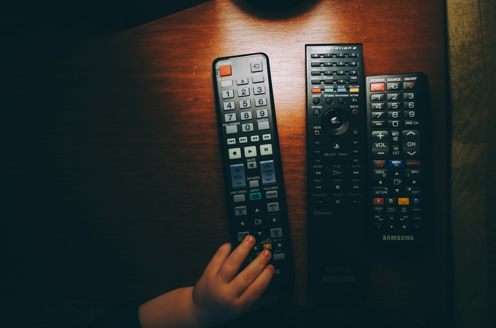 Handheld remote of the kind used to set adjustable bed positions and presets