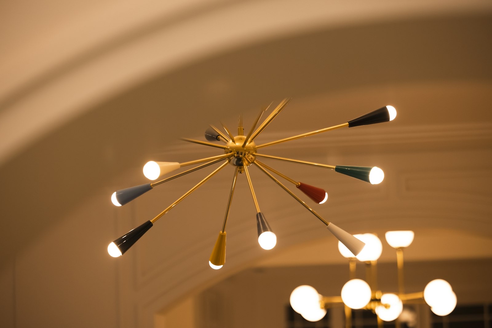 Ceiling fixture providing the ambient base layer of a room's lighting