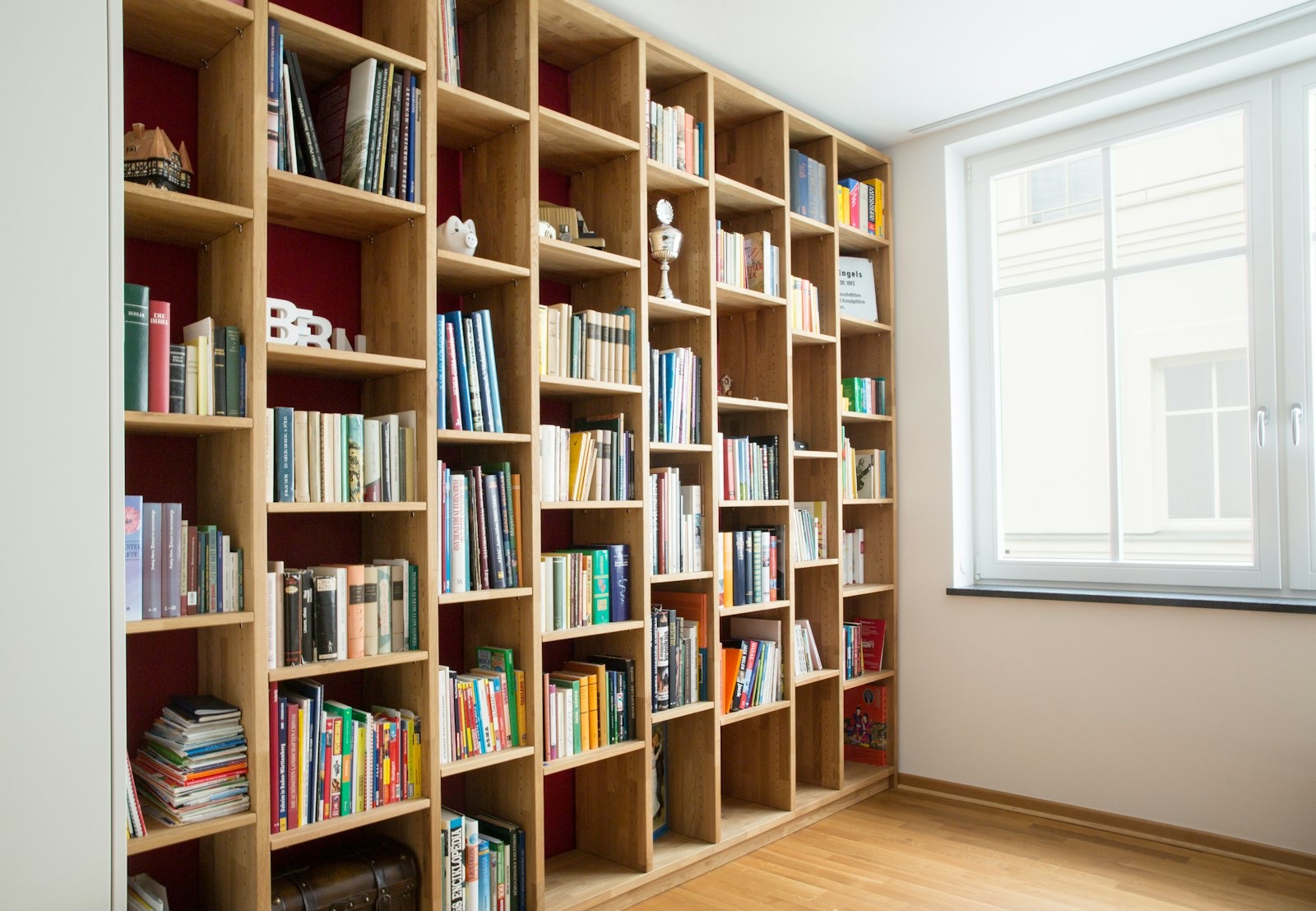 Bookcase filled with books against a living room wall