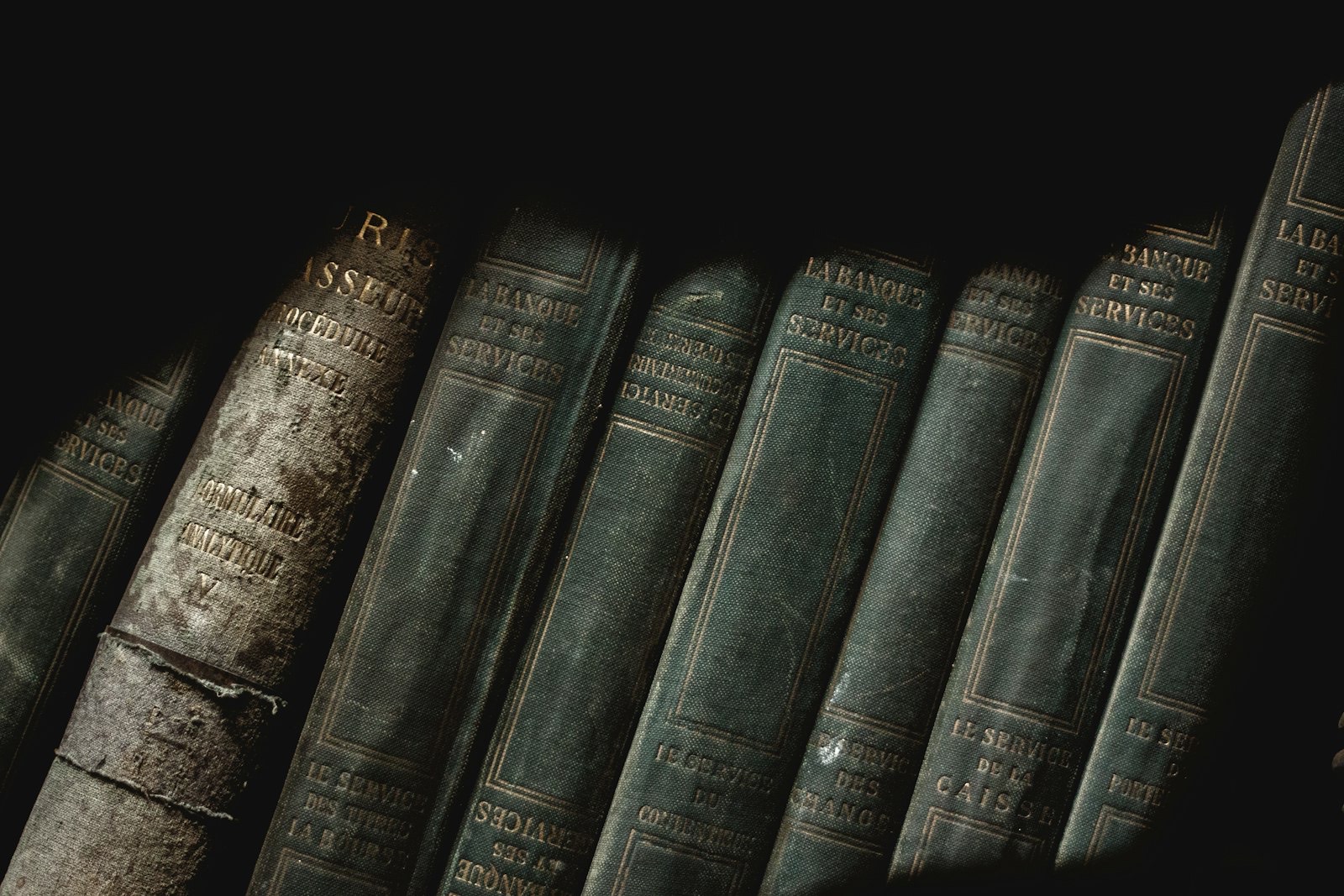 Books on a shelf showing how depth and clear height must match what you own