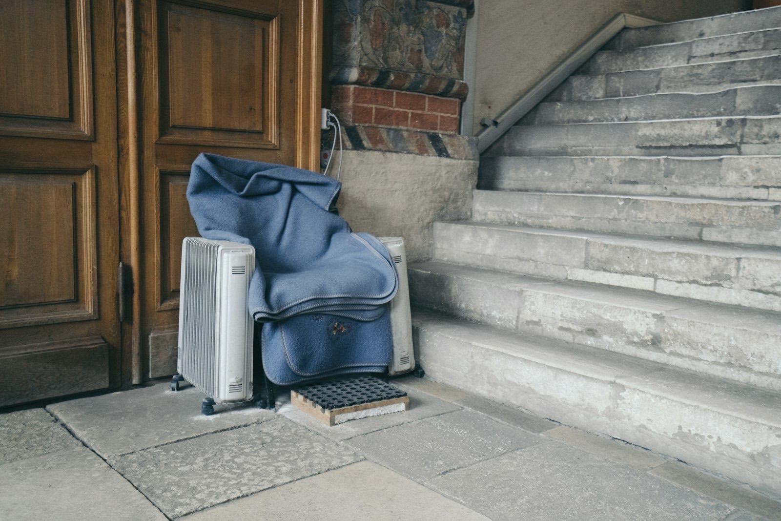 Furniture being carried through a doorway, where corner damage most often happens