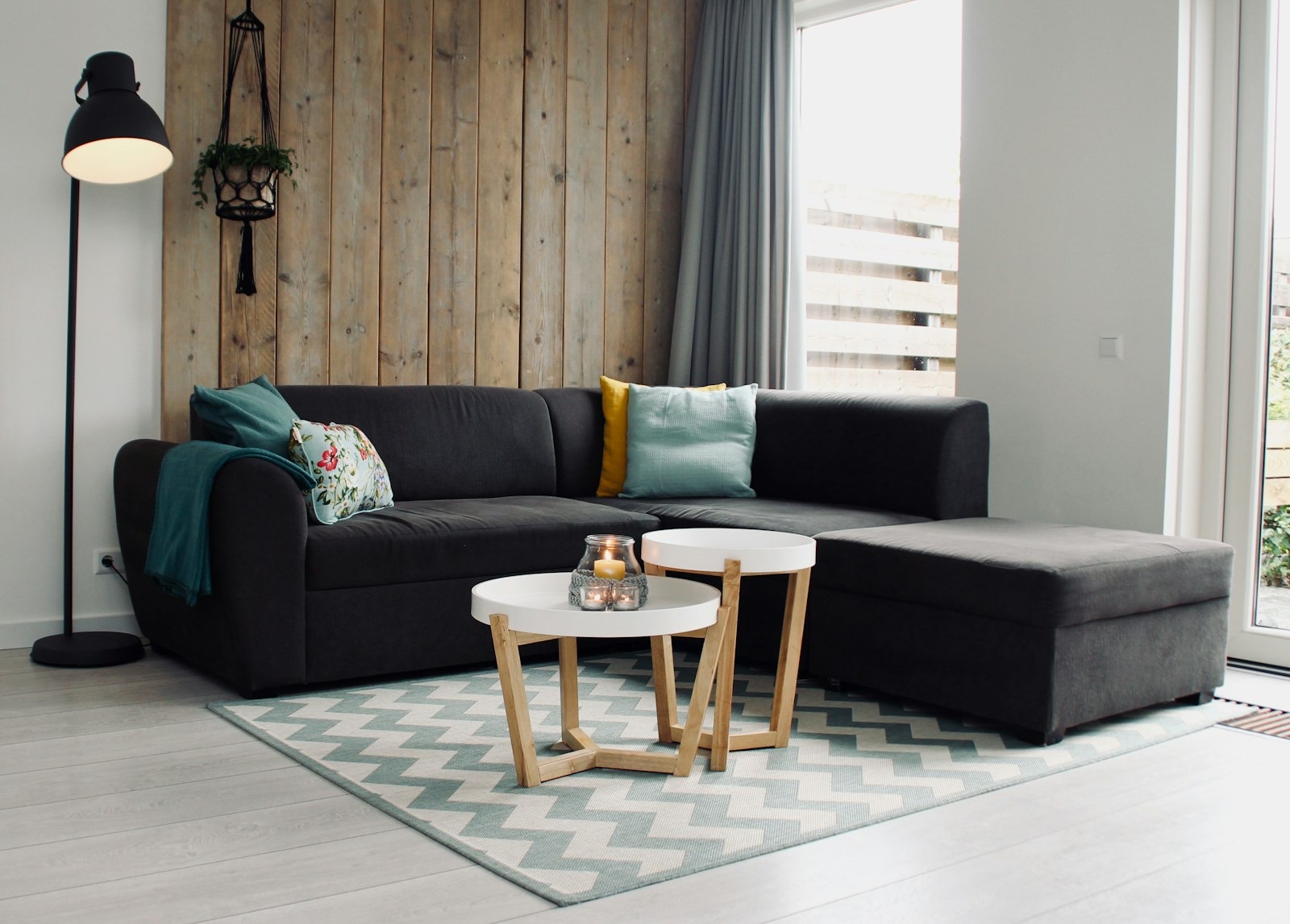 Coffee table positioned in front of a sofa at the correct height and distance