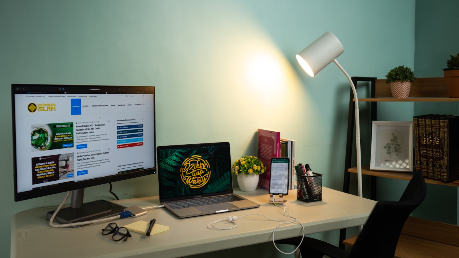 Compact desk in a bedroom corner, reading as furniture rather than office equipment