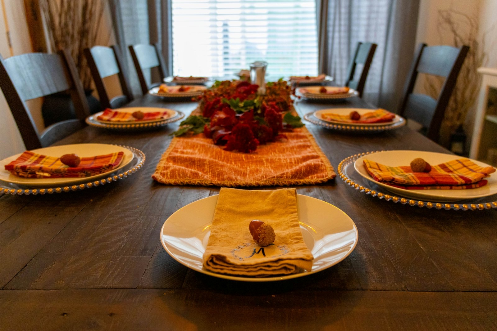 Table set for guests, showing the width each person needs to eat comfortably