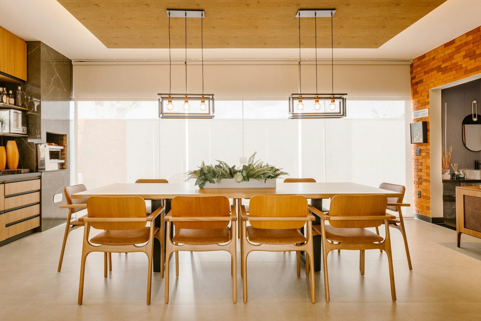 Pendant light hanging above a dining table at the correct height