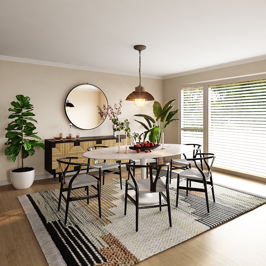 Modern round dining table with wishbone chairs