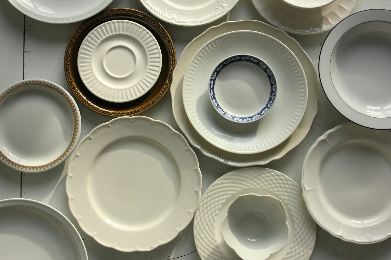 Ceramic plates and china arranged for display rather than everyday table use