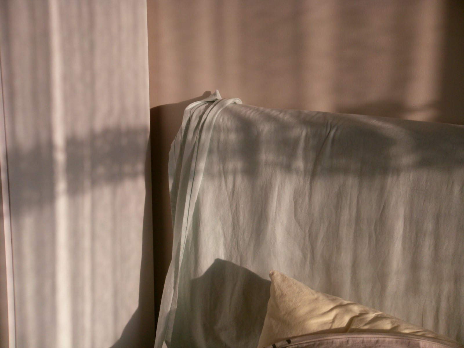 Bedding airing in sunlight, part of caring for a cotton futon mattress