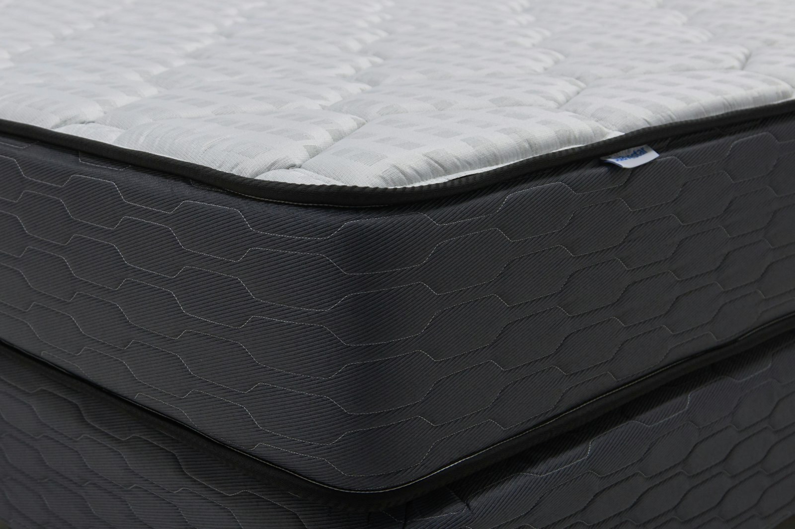 Mattress edge profile showing how thickness affects whether a frame folds