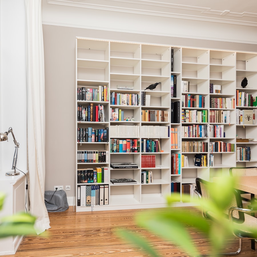 White built-in bookshelf storage wall