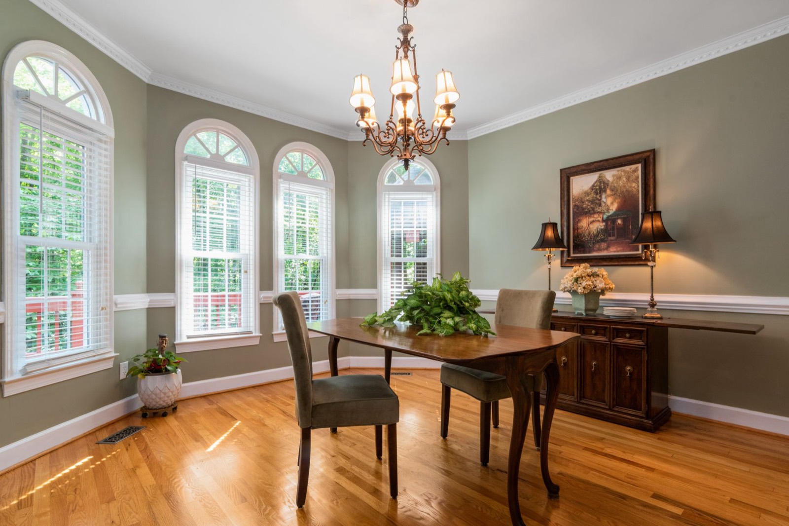 Dining room corner where a bar cabinet reclaims otherwise unused space