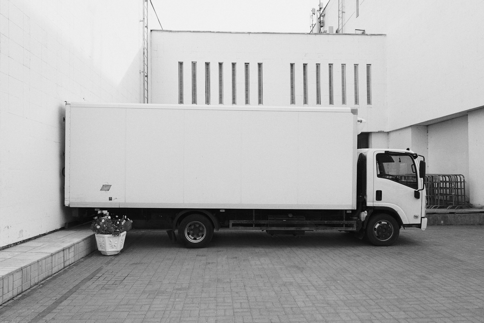 Household furniture being loaded into a moving truck