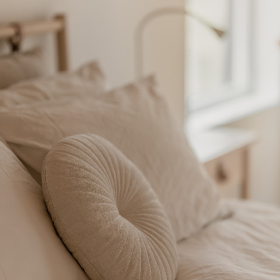 Neutral bedding with round pillow