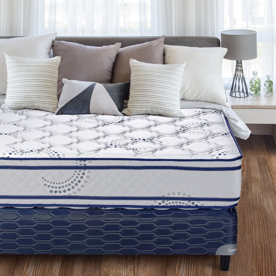 Quilted mattress on bed frame