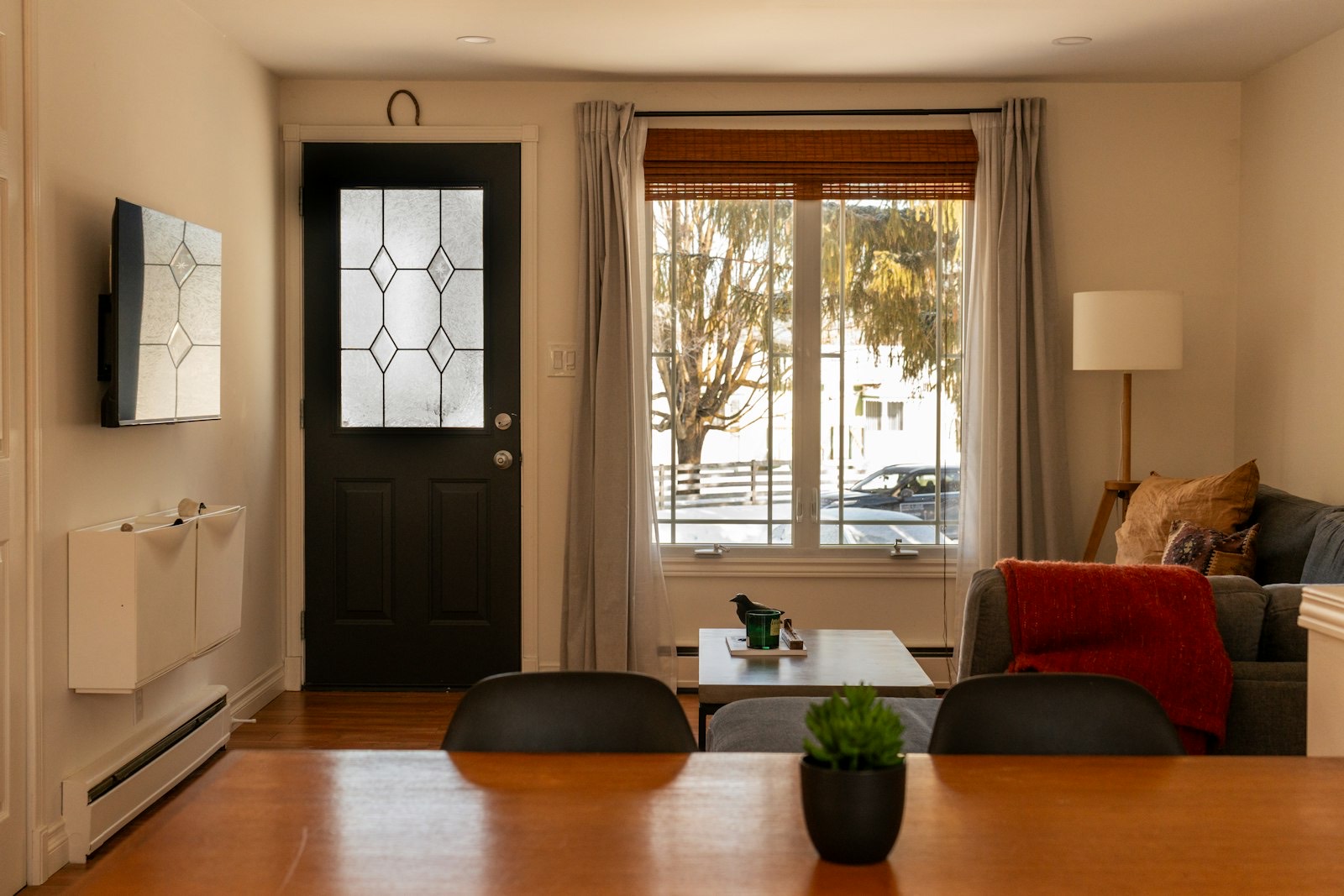 Front door opening directly into a living space with no separate entryway
