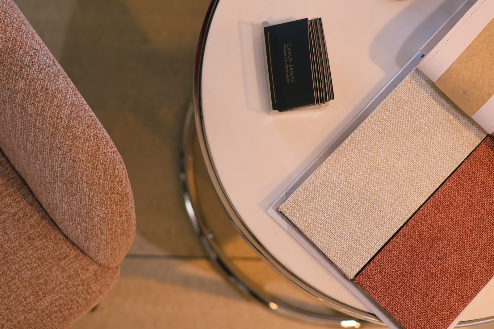 Upholstery options in a showroom where weave can be tested by hand before buying