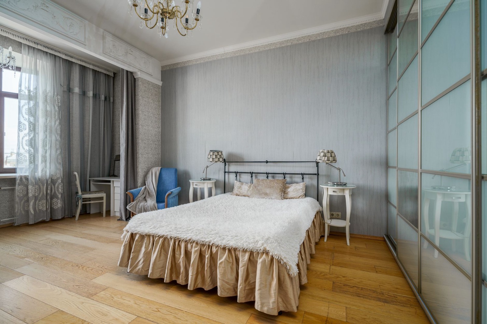 Bed dressed with pillows sized to match the width of the mattress
