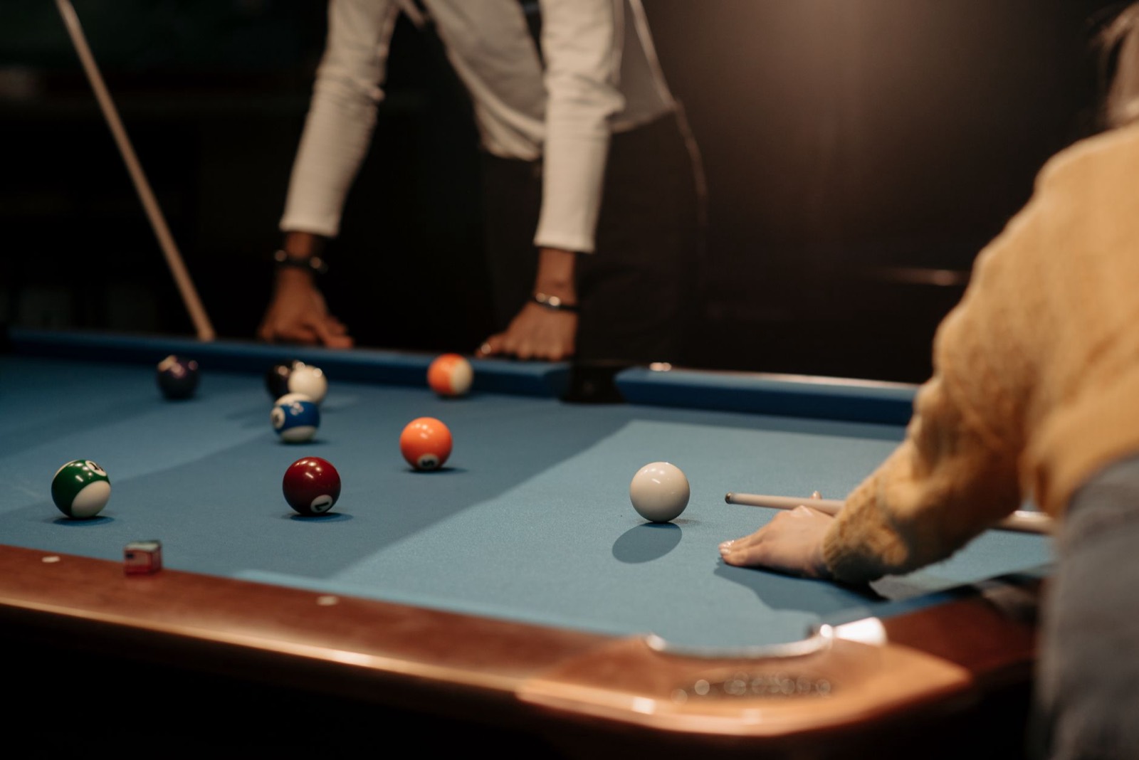 Player drawing back a cue, showing the clearance a shot actually needs