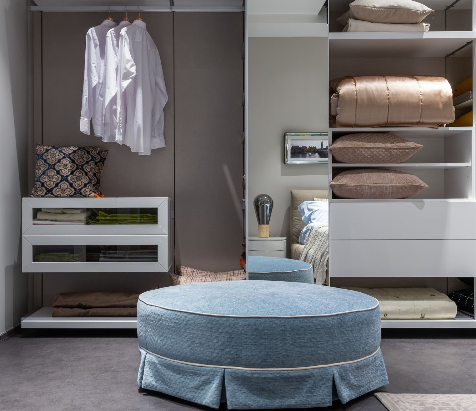 Round pouf used as light, movable casual seating in a living space