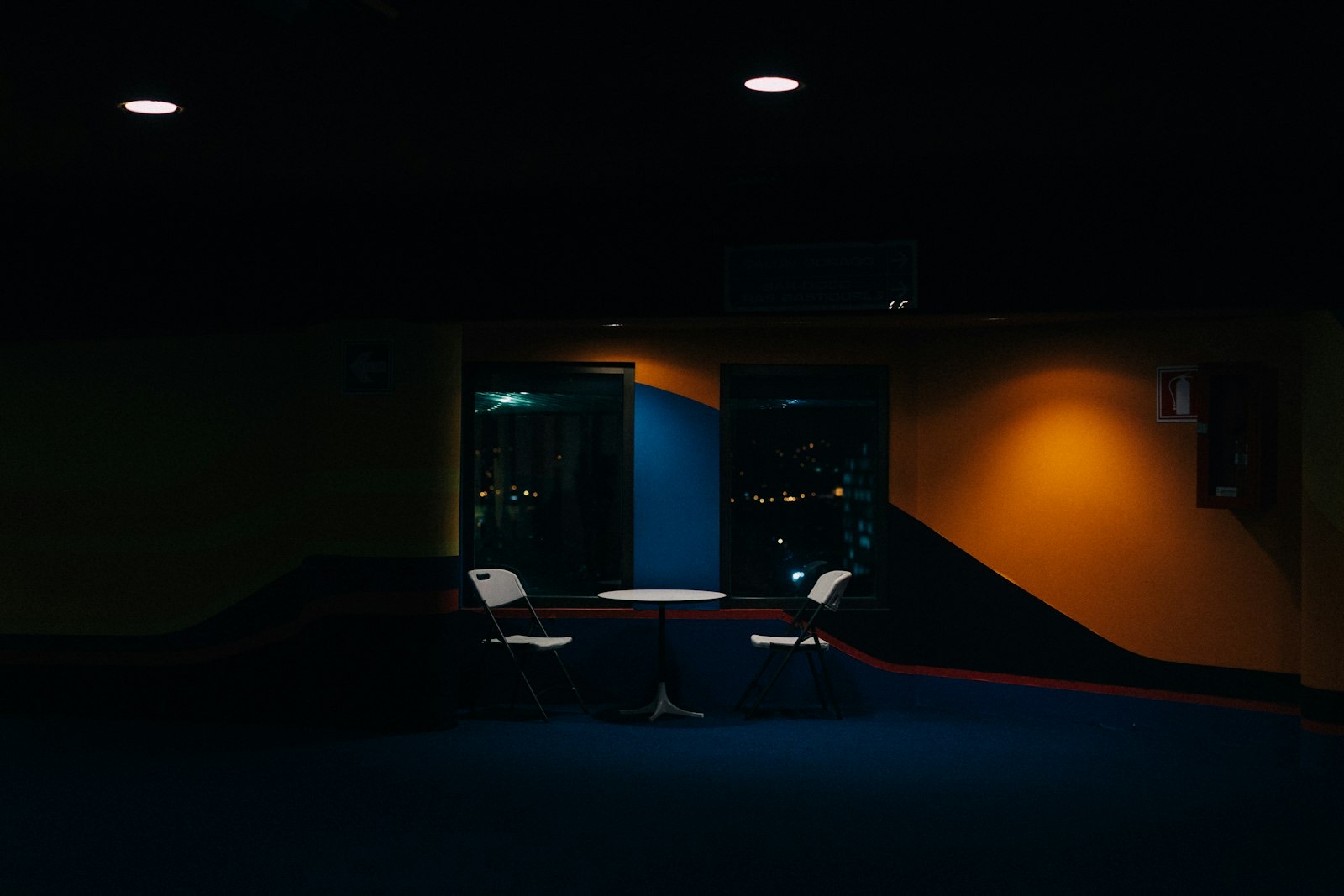 Projection screen in a darkened room, where viewing angle determines seat placement