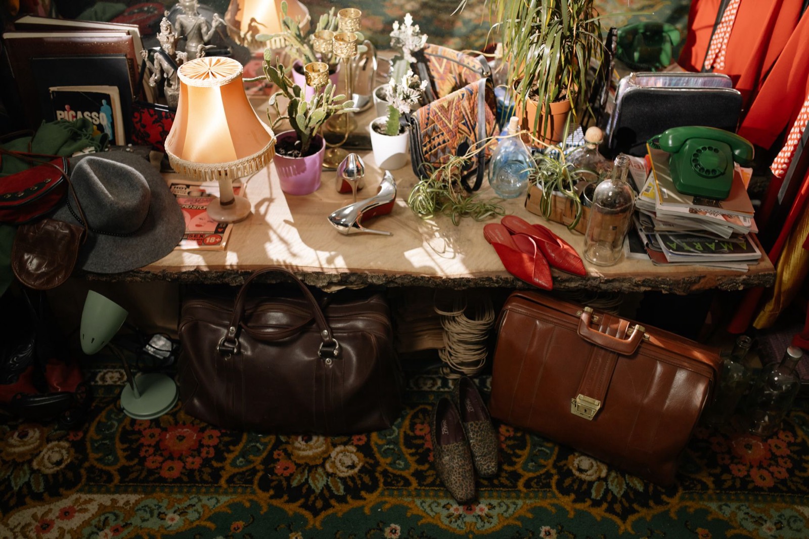 Secondhand furniture on a charity shop floor after being donated