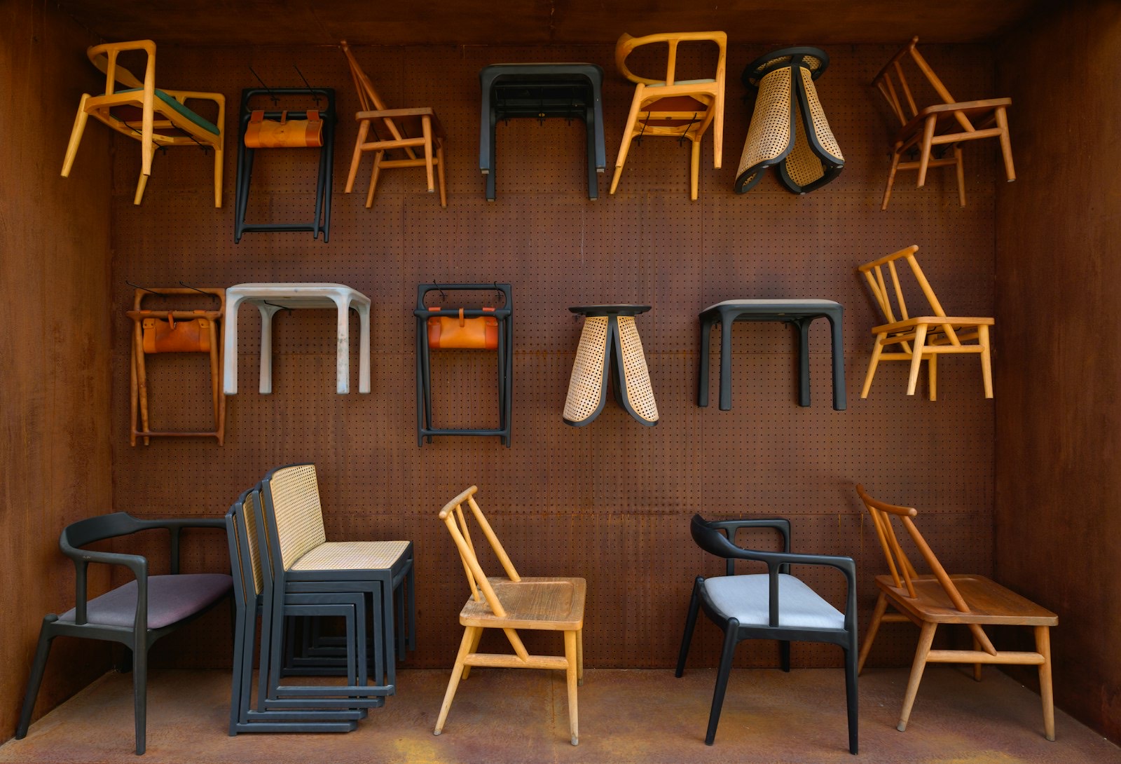 Chairs displayed in a showroom where gliding and rocking motion can be compared directly