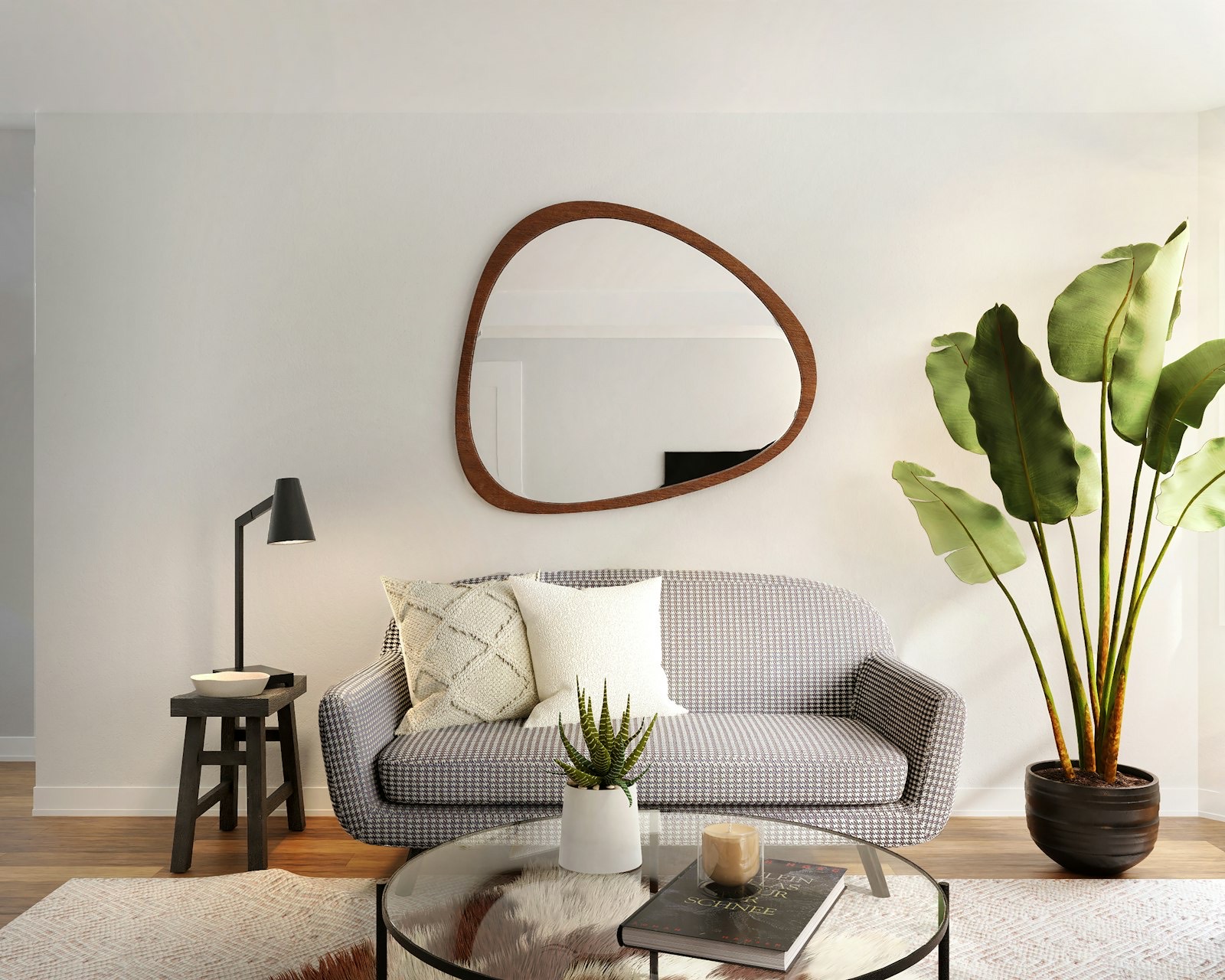Round mirror softening a room full of straight lines and rectangular furniture