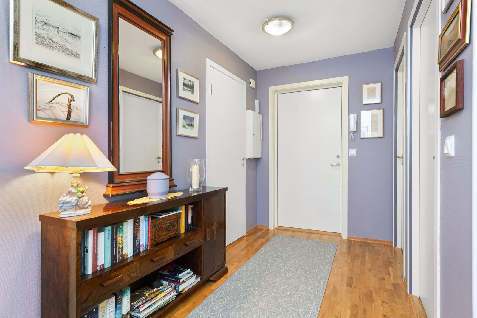 Runner rug in a narrow space, a budget alternative to one large area rug