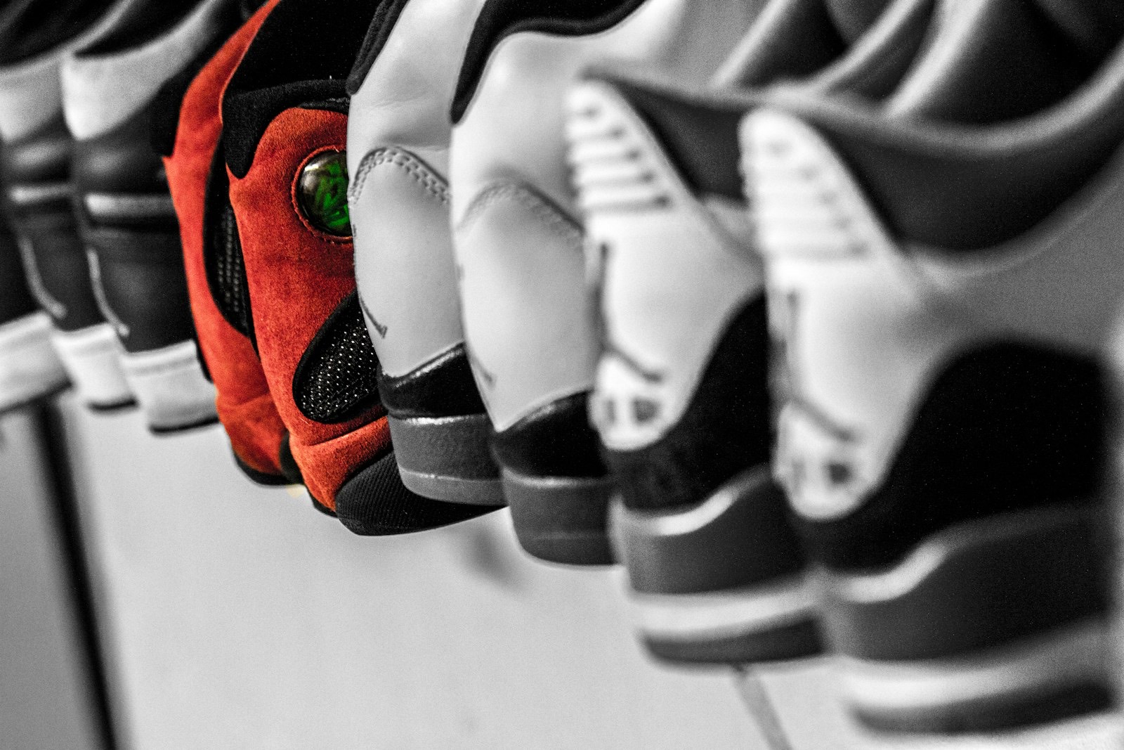 Shoes on open shelving where air can reach the soles to dry