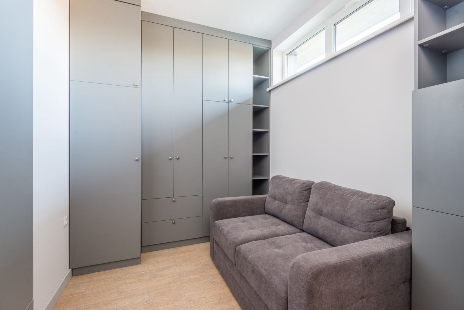 Living room floor space showing why the open footprint of a fold-out bed must be measured