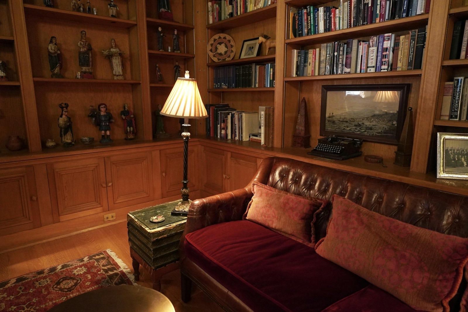 Tall bookcase reaching toward the ceiling, which must be anchored to the wall