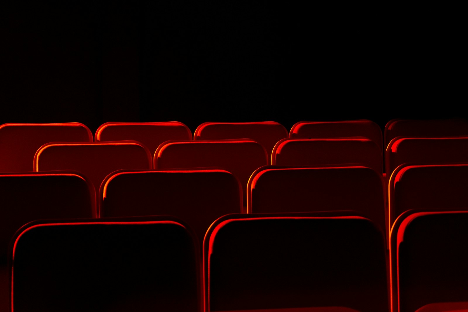 Rows of theater seats showing the spacing needed between them
