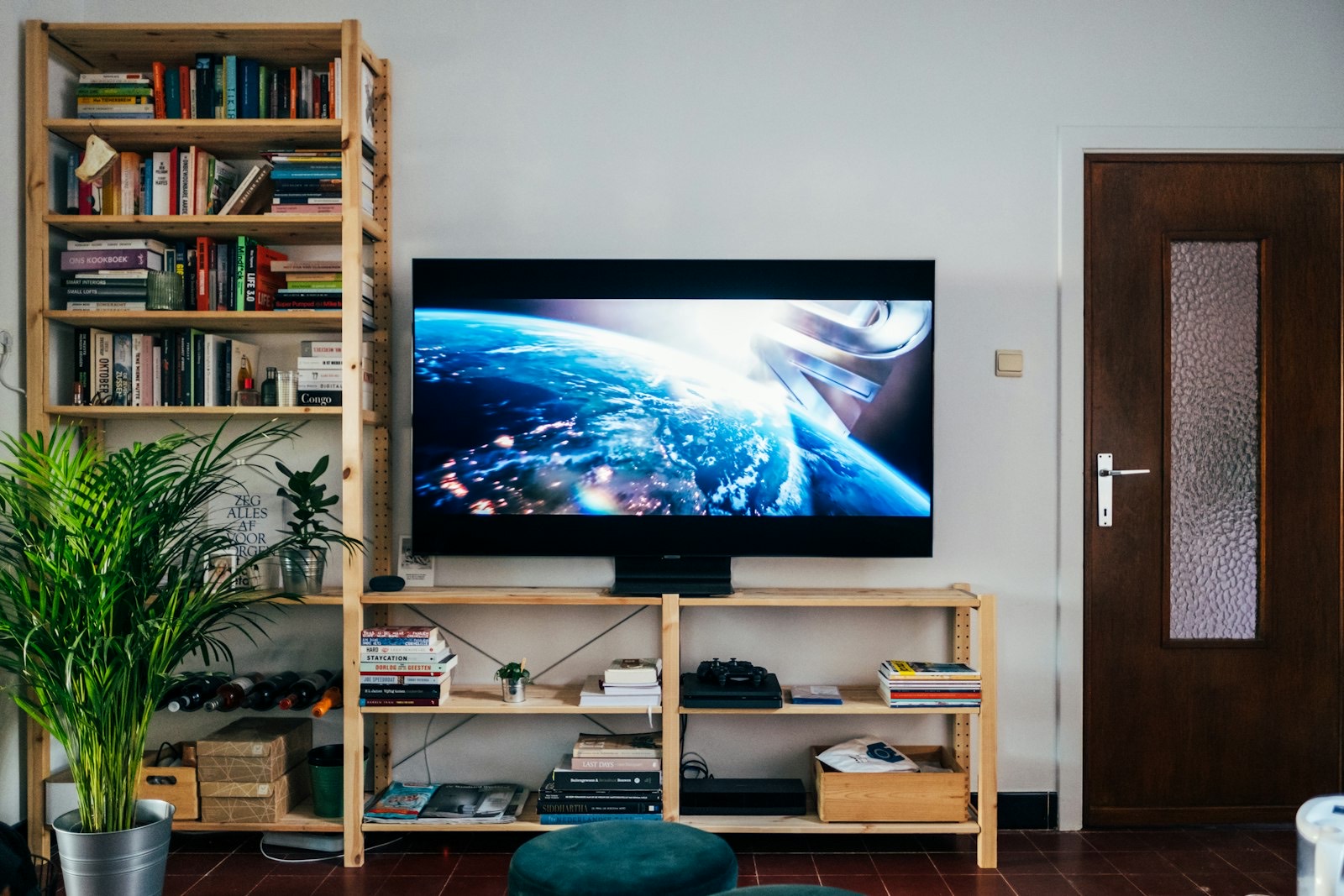 Television sitting on a low media console in a living room