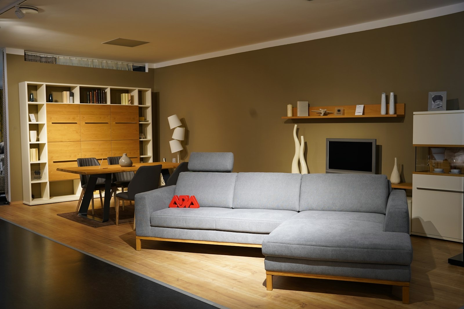 Media consoles displayed in a showroom where width and height can be checked