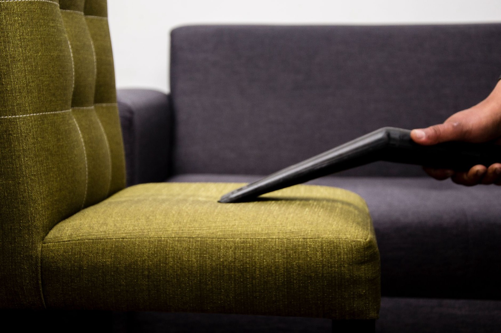 Upholstered seating being cleaned, where blotting rather than rubbing matters most