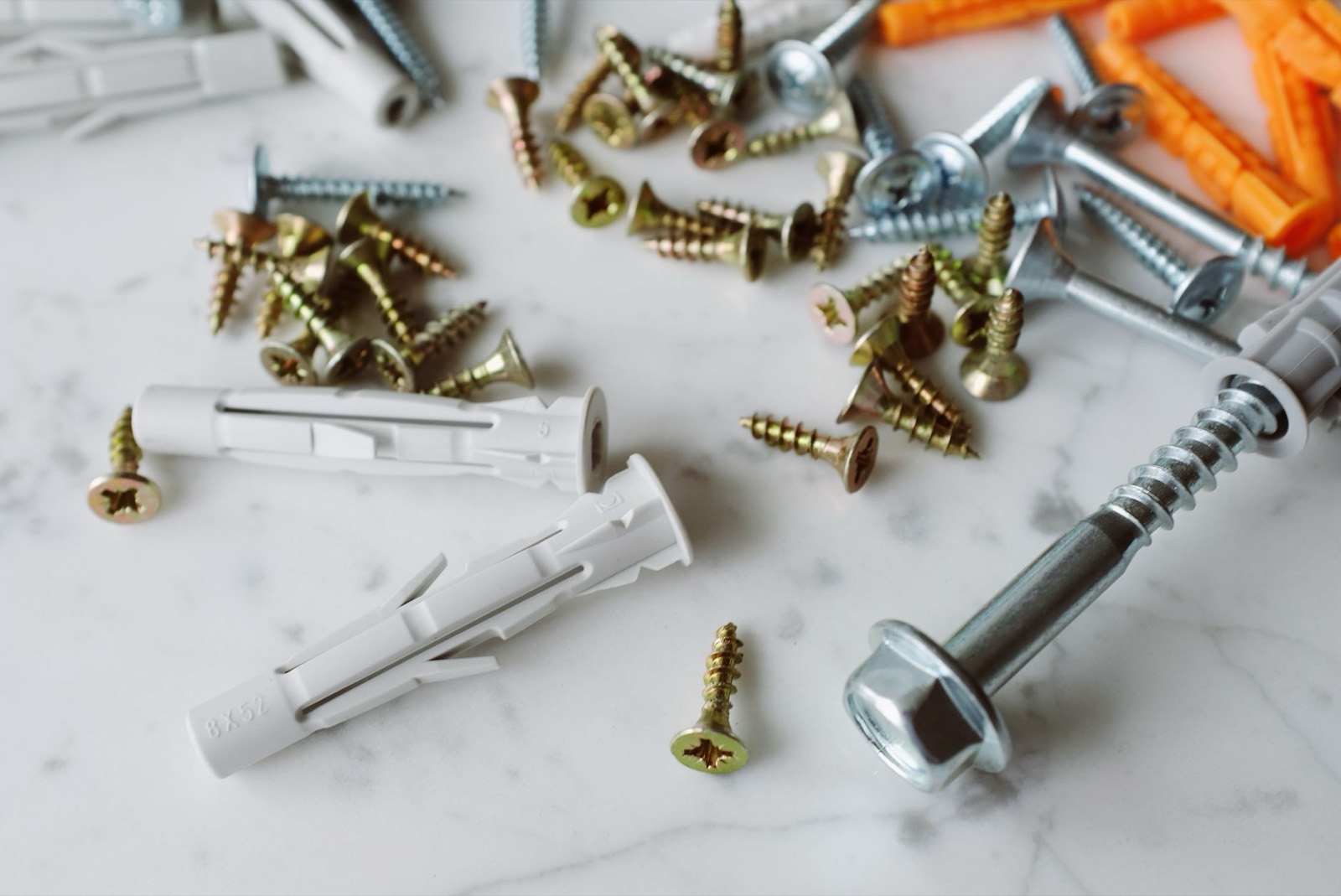 Wall anchoring hardware of the kind used to secure furniture to a stud