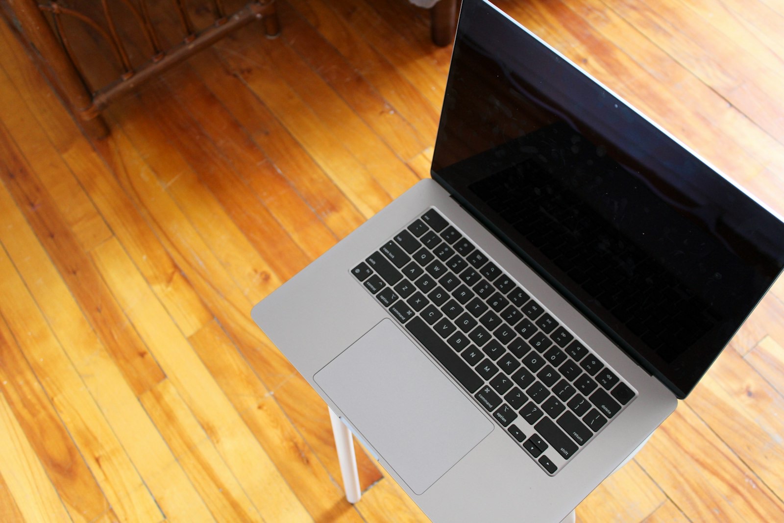 Shallow writing desk suited to a laptop rather than a monitor setup